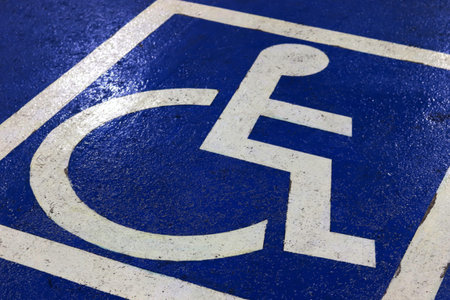 Parking symbol for the disabled in the car park (Selective Focus)の写真素材