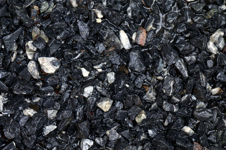 Stone wet for construction, wet Stone blue dark background, Rocks wet water for construction workの写真素材