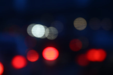 lighting red bokeh background black luxury night abstract multicolor lights, city night light blur...