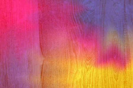 pink and yellow colorful wooden planks cracked background, colorful painted wooden texture wall, color abstract painting texture on the old wood surface backgroundの写真素材