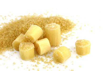 Sugar and sugarcane, piece of sugar cane cut and Sugarcane granulated sugar isolated on white background, Sugarcane fresh piece cut and sugar granulatedの写真素材