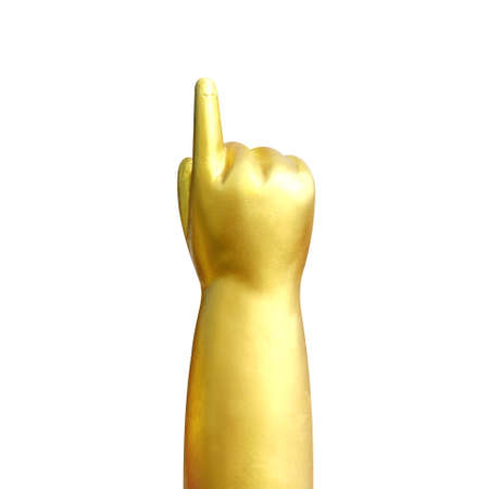 Golden statue Arms and index fingers of Buddha child,  Baby Buddha gold statue child isolated on white backgroundの写真素材
