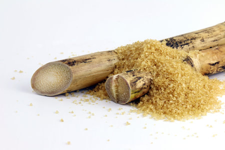 Sugarcane and sugar heap, Sugarcane burn, Cane piece and Sugarcane granulated sugar on white backgroundの写真素材