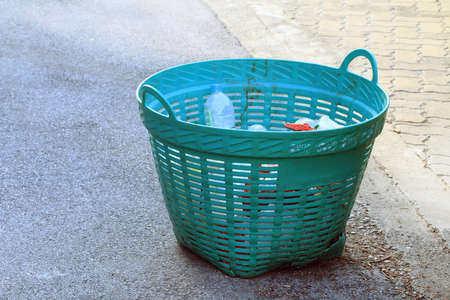 Plastic basket for garbage on the floor, bin, Waste plastic basket for recycle trashの写真素材