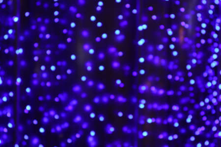 blurred violet purple bokeh light luxury background, gradient purple bokeh light glitter and shine backgroundの写真素材