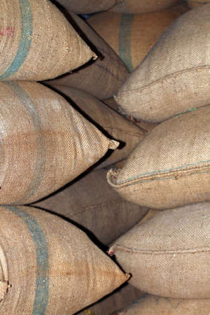 rice sack, rice sacks old, stack of rice sacks in warehouse store, rice sacks for backgroundの写真素材