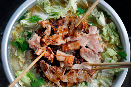 Thai barbecue Grill Pork on hot pan buffet, Moo-gata Pork pan It's traditional Thai style BBQ,...