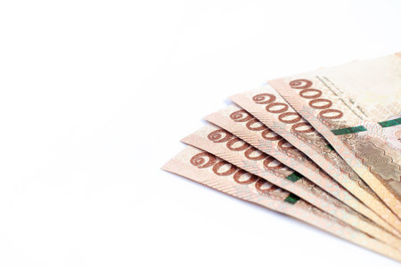 money banknote thai 1000 baht on white background, savings money and financial business concept,...
