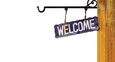 welcome sign retro hanging on wood wall, vintage welcome sign isolated on whiteの写真素材