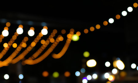 blur decorative lights bokeh colorful for background, decorative string lights outdoor at night time