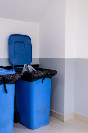 trash can, garbage bin on a floor, plastic wheel for waste containerの写真素材