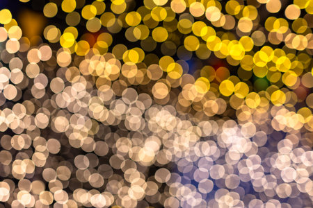 bokeh gold for xmas background, glowing colorful abstract wallpaper, christmas backgroundの写真素材