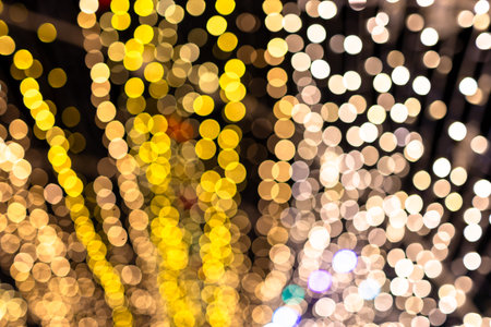 bokeh gold for xmas background, glowing colorful abstract wallpaper, christmas backgroundの写真素材