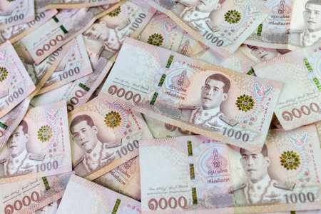 thai money banknote baht for background, pile of one thousand thai baht banknotes, savings money and...