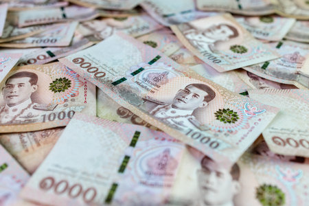 thai money banknote baht for background, pile of one thousand thai baht banknotes, savings money and...