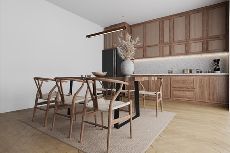 A bright kitchen and dining interior with wood, and cane furniture.の写真素材