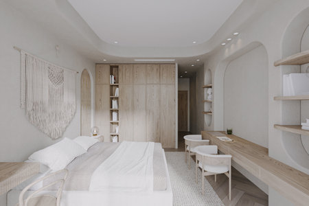 A white cozy bed Craft wooden chairs with a wall-attached Table for reading purposes in the bedroom.の写真素材