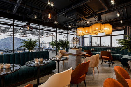 The restaurant features tables and chairs, lighting, and a city view from a loft space.の写真素材