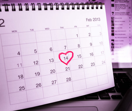 Valentine's Day Calendar on notebook computer in real office.