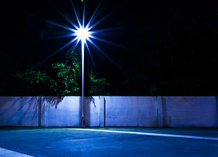 Light and Brick Wall on park at night time.の写真素材