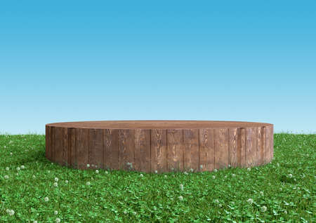 Round wood podium, pedestal or stand display on summer landscape with green grass and blue sky. Realistic 3d illustration. Abstract nature composition.の写真素材
