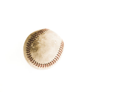 Isolated used baseball ball on white background with copy space.の写真素材