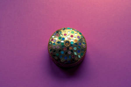 colorful indian box on pink table.の写真素材
