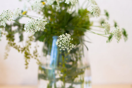 flower arrangement in water on table.の写真素材