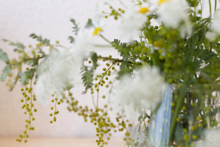 flower arrangement in water on table.の写真素材