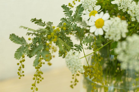 flower arrangement in water on table.の写真素材