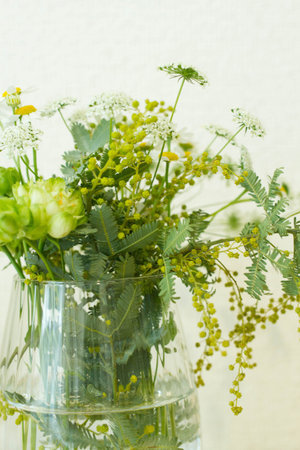 flower arrangement in water on table.の写真素材