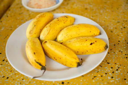 banana on wood table .の写真素材