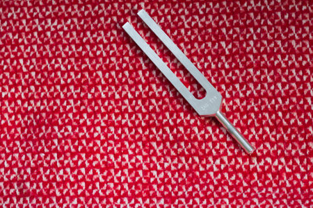 tuning fork and crystal on table .