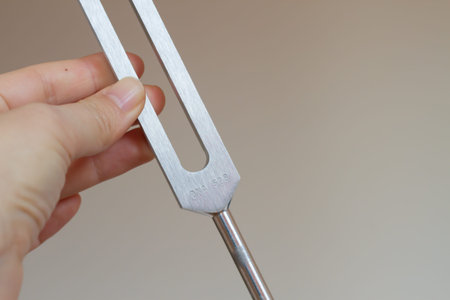 tuning fork and crystal on table .