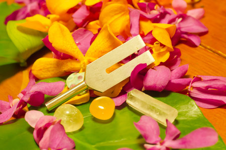 tuning fork and crystal on table.の写真素材