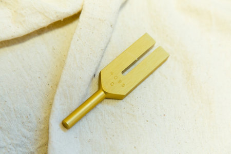 Close-up of a small wooden fork on a piece of cloth