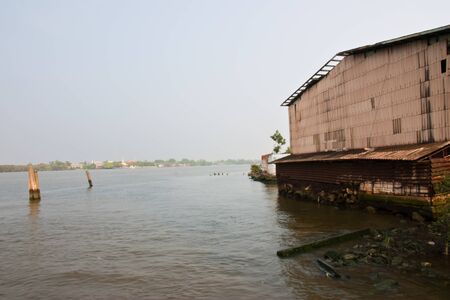 Old factory Chao Phraya River in Samut Prakan province, Thailand の写真素材
