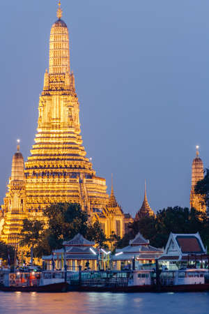 Golden light of Phra Prang Wat Arun in Bangkok of Thailand の写真素材