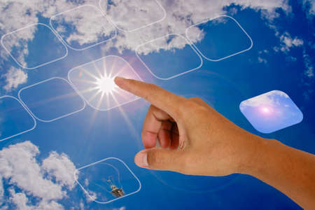 Idea, fingers are button touch screen energy from sun の写真素材