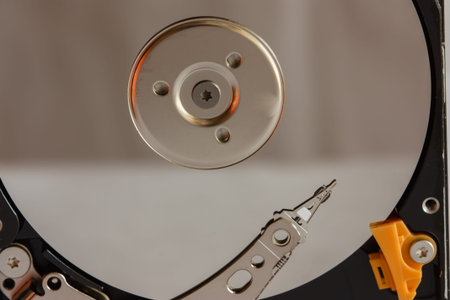 close up of hard disk with abstract reflection