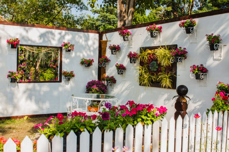 The outdoor landscaping with flowers. Have tables and chairs for relaxingのeditorial素材