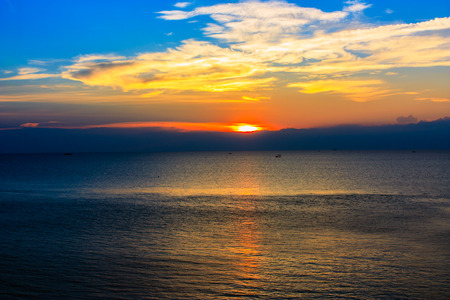 Beautiful sunset sky with clouds on seaの写真素材