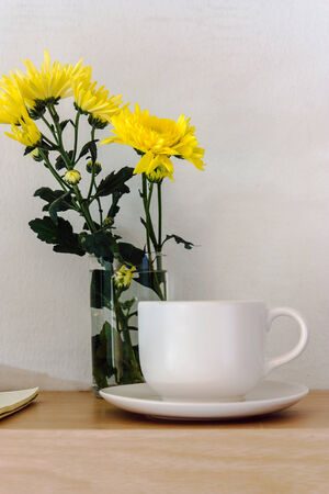 Coffee mug with flowersの写真素材