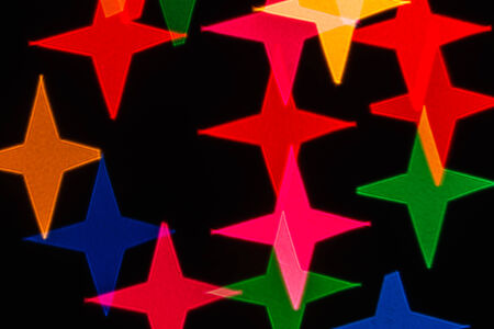 Four radial defocused colorful light, beautiful background の写真素材