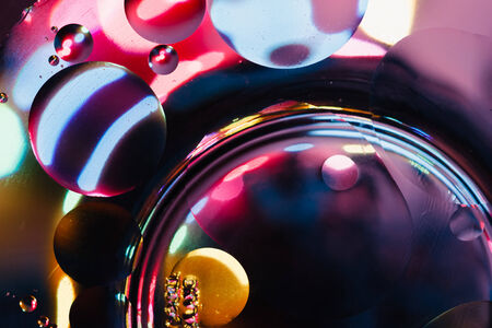 Oil drops on a water surface  have  colorfulの写真素材