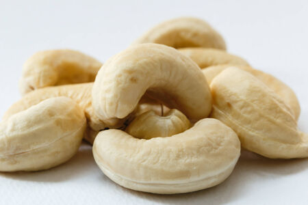 Cashew nuts placed on a white background.の写真素材