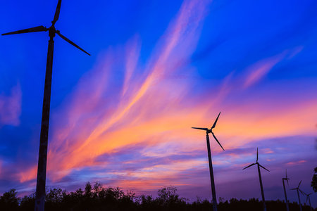 Beautiful sky with wind turbines. After sunsetの写真素材