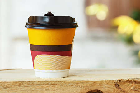 paper cups coffee on  wood with backgroundの写真素材
