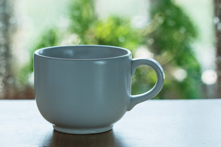 cups coffee placed on table with blur background