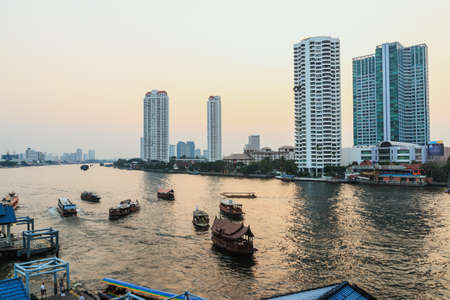 Building hotel with ship and river in Bangkok, Thailandのeditorial素材